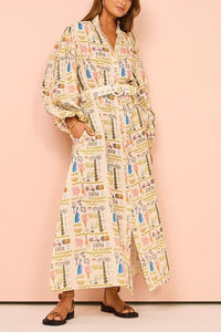 Cute and trendy printed long sleeve button down shirt dress with waist belt.

This dress features a lightweight fabric, adorned with vibrant, summery prints that exude an effortless charm.

A matching belt cinches the waist, creating a flattering, feminine shape that suits any body type.